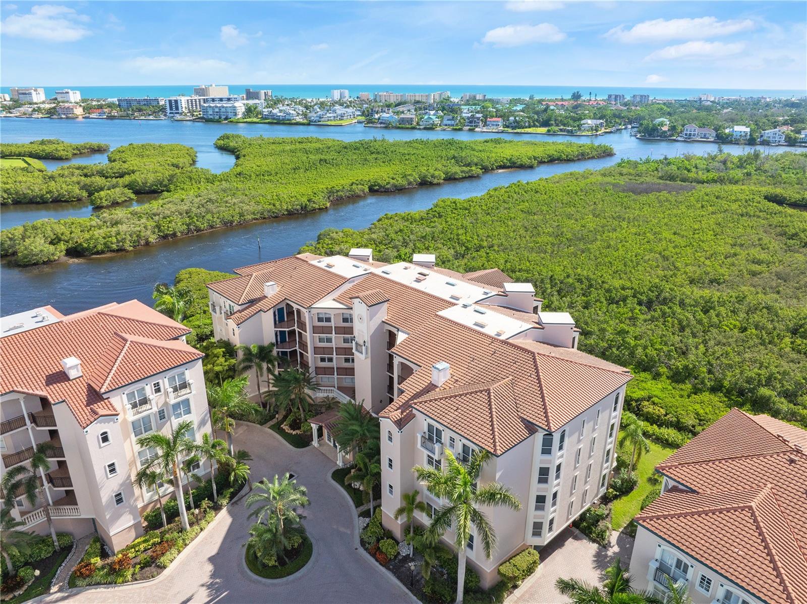 One or more photo(s) has been virtually staged. Discover this beautifully renovated 2-bedroom, 2-bathroom condo with a versatile office that may serve as a third bedroom. Offering 1,843 square feet of upgraded living space, located in the highly desirable community of The Landings in Sarasota—just minutes away from the world famous Siesta Key Beach, Florida. This elegant residence features brand-new appliances, modern finishes, and a thoughtful layout designed for both comfort and style.
Enjoy breathtaking sunset views from the great room and the primary bedroom, both of which overlook the serene Phillippi Creek. The spacious guest bedroom, guest bathroom, and a flexible office—accessible through French doors from the entryway—provide additional space for work, relaxation, or hosting visitors.
Residents of The Landings enjoy an array of resort-style amenities, including multiple swimming pools, tennis courts, outdoor grilling areas, scenic nature trails, a well-equipped fitness center, and the added security of a manned gate.
Conveniently located near Sarasota’s top-rated beaches, dining, shopping, and cultural attractions, this property presents an exceptional opportunity for both primary residence and investment.