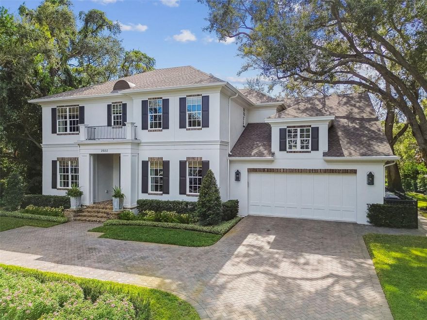 Welcome to this stunning, sophisticated and impeccably maintained South Tampa home, custom-built by Bayfair. Set on almost half an acre, this exquisite, one-of-a-kind property offers a rare, tranquil retreat with its Audubon-like pond setting replete with natural beauty. Step inside, and you'll be struck by the elegance of this home’s artfully-designed, light-filled spaces, starting with a spacious foyer, library/study to the left and a formal dining room to the right with ample space for entertaining. The open living/kitchen floor plan boasts a warm, inviting atmosphere and is brimming with both functional and aesthetic details. Highlights include an all-glass, fully-retractable Nano-wall that seamlessly expands interior living space into the exterior screened-in lanai; coffered ceilings; stone wall accents and gas fireplaces in both interior and exterior living spaces; climate-controlled 500+ bottle wine cellar, wet bar with ice maker and much, much more. The eat-in kitchen is has all the upgrades including top-of-the-line Thermador appliances, custom wood cabinetry and beautiful marble counters – plus incredible light and views from the large windows overlooking the pool and pond and a large walk-in pantry. Downstairs also boasts a spacious office/playroom with even more gorgeous views of the pond and mud-room area; two half-baths (one of which comes with a full size washer & drier) and hidden media closet to access your smart-home Control4 powered A/V and security systems. Choose either elevator or a beautiful wooden stairway to discover the 2nd floor, on which you'll find the master suite, complete with automated black-out curtains, a luxurious garden tub, large walk-in shower, dual sink vanities, and 2 oversized walk-in custom closets. Three additional en-suite bedrooms provide plenty of space for family or guests. With an additional full-size laundry room + plentiful storage closets (and storage room off master suite) – this home truly ‘has it all’. Step outside, and discover a true oasis from the screened-in, back patio / pool area – spacious enough for grilling and entertaining or simply perfect for a peaceful evening while overlooking the magnificent pond. Whether you cool off in the pool or spa during summers, or cozy up to the fire and built-in heaters during winter – you’ll be able to enjoy your exterior space and views year-round. This luxurious South Tampa gem simply has it all - a perfect blend of elegance, comfort, and convenience. Additional upgrades include a full-house powered natural gas home generator, custom blinds and window treatments, beautiful textured wall coverings, and so much more. Book your private tour today and experience it for yourself!