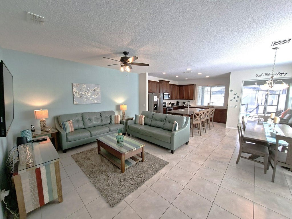 Photo of 1586 Carey Palm Circle, Kissimmee, FL 34747 (MLS # O6452274)