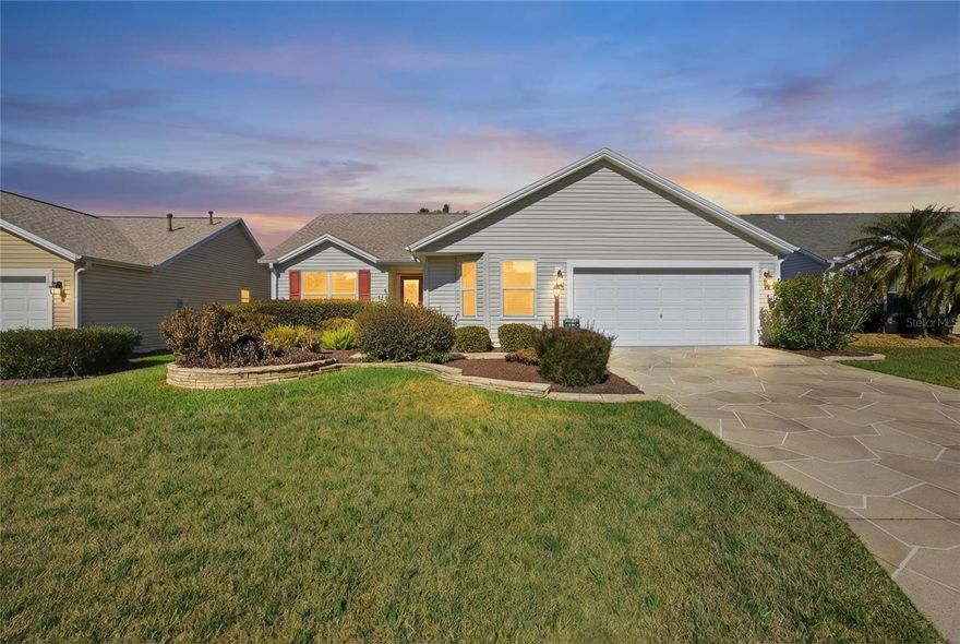 OWNER MOTIVATED.  TURN KEY OPPORTUNITY. Welcome to this beautifully maintained 3 bedroom, 2 bath Wisteria model located in the highly sought after Village of Winifred in The Villages—close to shopping, dining, golf, and all the amenities that make The Villages lifestyle so desirable.
The open, eat-in kitchen is perfect for everyday living and entertaining, featuring a breakfast bar, stainless steel appliances, new kitchen countertops, and a custom pantry with pull-out shelves and drawers. The spacious primary suite offers a large walk-in closet with built-ins, while the en-suite bath includes double vanities, a walk-in glass shower, and a linen closet.
Oversized guest bedrooms provide generous closet space and added privacy with a sliding pocket door, along with a guest bath featuring a tub/shower combo. The living room opens seamlessly to the window and screen-enclosed Grand Florida Room with river rock flooring, creating additional living space to enjoy Florida’s beautiful weather year round!
Recent updates and features include a new roof (12/2022), A/C (06/2021), sprinkler control meter (09/2022), engineered hardwood flooring in the bedrooms, and a whole-home Bluetooth stereo system.
This move in ready home is a must see and won’t last long. Schedule your private showing today.