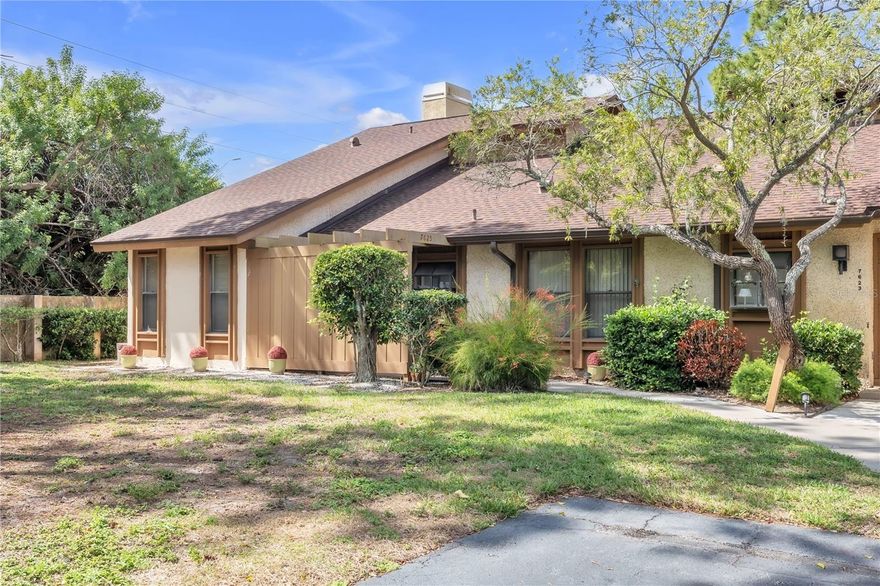 Spacious 3 Bedroom 2 Bath end unit Villa, set amid lush landscaping, in the Pine Bay Forest Community of North West Bradenton. Enjoy covered parking and a private walkway to this spacious 1485sf villa.  Step into the foyer and look up at the beautiful cedar vaulted ceilings in the open living/dining room.  Settle in front of the wood burning fireplace on the few chilly nights in Florida! Sliders lead out to the covered screened in lanai with neutral tile.  A large storage room is there for beach toys and bikes.
Step back inside and enjoy the kitchen with stainless steel appliances and a greenhouse window for your herbs. A guest bedroom with Jack and Jill Bath is situated for privacy for guests.  On the opposite end of the condo is a third bedroom, laundry room with storage and a large Primary   Bedroom with vaulted ceilings, two walk in closets, sliders to lanai and an ensuite bathroom with tow sinks and a bidet.  A wall of glass overlooks the private area, feeling like you're outside.
Walk to the Private amenities including heated pool, spa, saunas, tennis and pickleball courts and shuffleboard.  There is also a nice pavered patio for meeting neighbors and friends. Walk to the end of 4th Avenue to the private Overlook to enjoy the sunsets while sip a glass of wine.  All this and only 4 miles to Anna Maria Island Beaches, a bike ride to Robinson Preserve and a walk to shopping and grocery stores.
Enjoy the ease of condo living where everything is included in the monthly fee except your electric bill!  This unit is not like most condos in the area and you must see the difference inside!