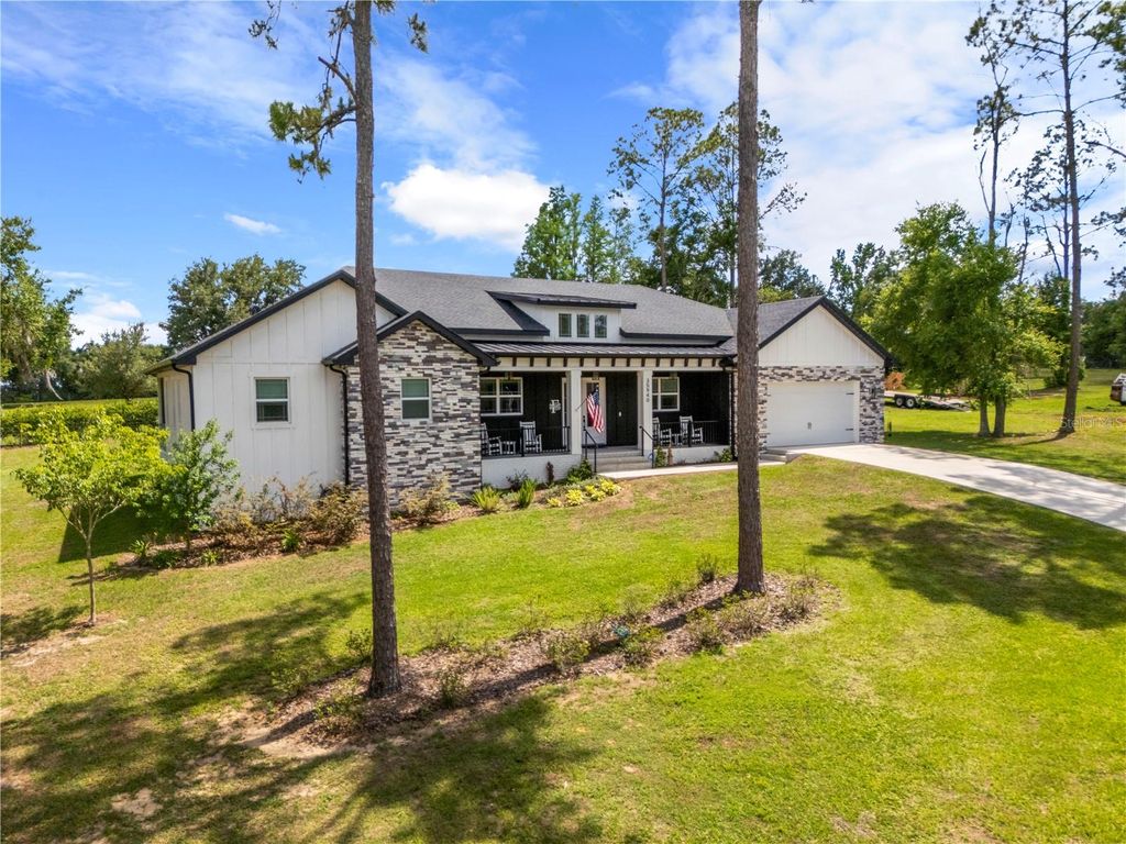 Photo of 35940 Ramsey Ridge Drive, Dade City, FL 33523 (MLS # TB8511394)
