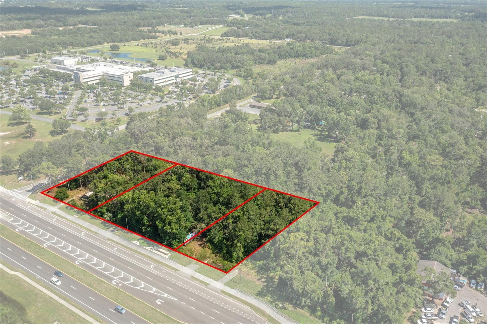 PRIME COMMERCIAL DEVELOPMENT OPPORTUNITY – 2.2 ACRES Composed of 3 PARCELS on SR50 (Cortez Blvd) in Brooksville, FL. Located directly adjacent to Tampa General Hospital – Brooksville campus. This high-visibility location offers over 2 acres of land with Commercial (C1 & C2) zoning. Ideal for medical, professional office, retail, or mixed-use development. High traffic counts create constant visibility for your business or medical practice. Accessibility and convenience with approximately 456' of excellent road frontage, on public transportation line, newly installed sidewalks, and turn in access from East and westbound traffic. Just minutes from downtown Brooksville (4 miles), US-41, and the Suncoast Parkway/SR589 (2.5 miles). Surrounded by national retailers, restaurants, healthcare providers, residential communities with constant development to both the east and west. Don't miss this rare opportunity to invest in a booming medical and commercial corridor!