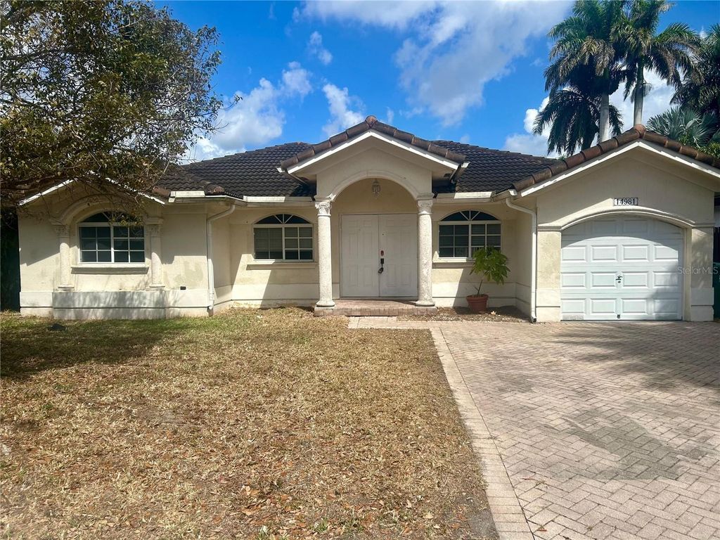 Photo of 14981 SW 180th Ter, Miami, FL 33187 (MLS # TB8484822)