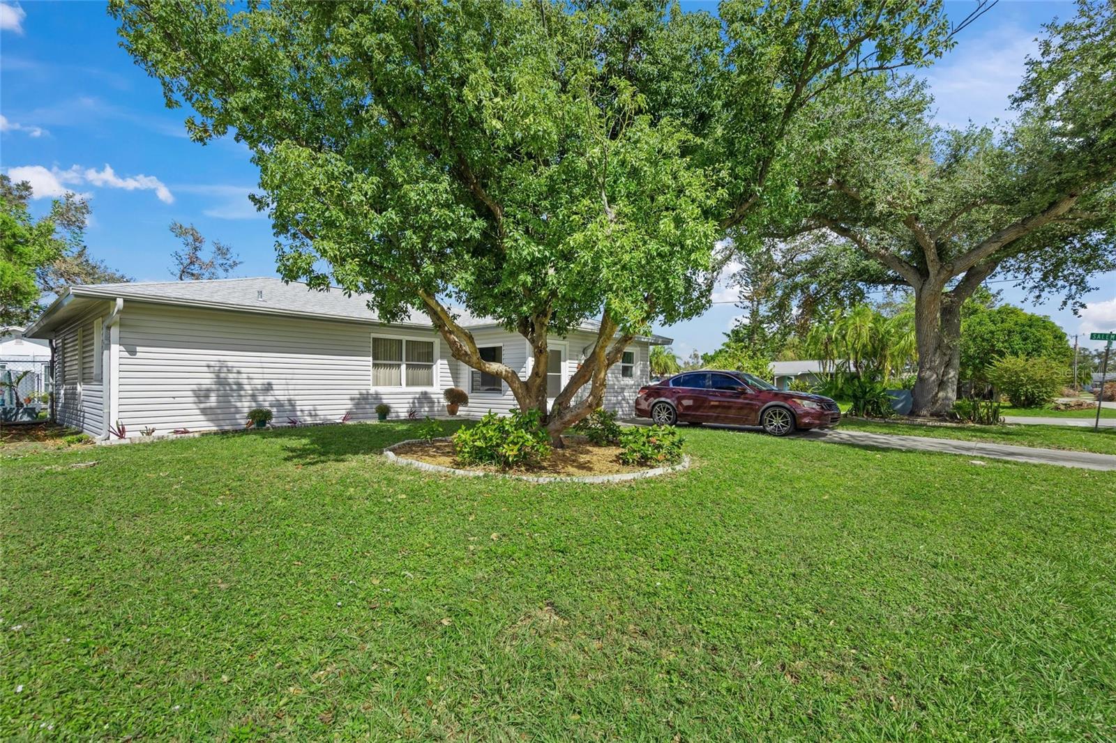 This could be your affordable Sarasota home. Charming 3/2 in excellent shape. There are many improvement here...All new kitchen in 2019. New A/C 2019 (has just been serviced). New roof 2023. Brand new dishwasher, water heater, disposal (2/25). Inside utility has laundry sink and recent washer and dryer. Baths have updated vanities and shower upgrades too. The owners' suite has a good sized walk in closet. All bedrooms have fans and the second bedroom has newer windows. The home is vinyl sided but masonry construction (public records). The large, corner lot is nicely landscaped, fenced and has a convenient storage shed to keep all your tools and toys. Conveniently located just minutes from medical facility, I-75, and all kinds of shopping opportunities, this home also has quick and easy access to the beach. DON'T MISS THIS EXCELLENT OPPORTUNITY. The home is move in ready.