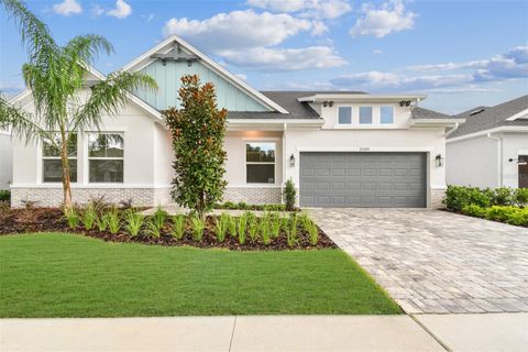 Photo of 31486 Hayman Loop, Wesley Chapel, FL 33545 (MLS # TB8414503) Photo of 31486 Hayman Loop, Wesley Chapel, FL 33545 (MLS # TB8414503)