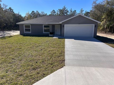 Photo of 23232 SW Green Bay Drive, Dunnellon, FL 34431 (MLS # OM709986)