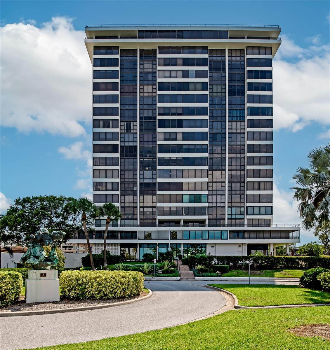 A breathtaking view can be enjoyed from this unit. The Embassy House is one of Sarasota's most iconic buildings.Renovations have been made to the property to give it a modern feel. In the heart of downtown, conveniently located across from Selby Botanical Garden’s, the John Ringling Bridge, Golden Gate Point, Bird Key, Lido Key, Siesta Key, as well as the Gulf of Mexico can be seen from your kitchen, dining room, and living area. The main living areas have an open concept with a west-facing wall of windows, perfect for watching the sunset. You can enjoy the dry bar with voice-activated lighting. The kitchen has quartz, with quartz-clad countertops and backsplash, modern custom cabinetry with Jeffrey Alexander pulls, and stainless Samsung appliances including a double convection oven and induction cooktop. A kitchen island with quartz waterfall edge and French door beverage refrigerator, under the cabinet, is perfect if you enjoy hosting. The pantry has plenty of storage, with pullouts. The owners suite and guest room both have east-facing views overlooking the city.Perfectly positioned to welcome the morning sunrise. There is white oak engineered wood flooring throughout. The Embassy House is safe and secure place with security on site. The lobby and amenities such as the pool and gym have been recently renovated with luxury mid-century modern finishes. Furnished so you can move in and enjoy the best of downtown Sarasota