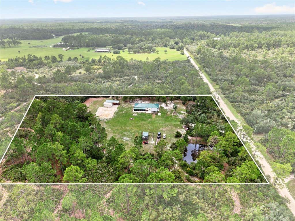 Photo of 10550 SW 52nd Place, Cedar Key, FL 32625 (MLS # GC542600)