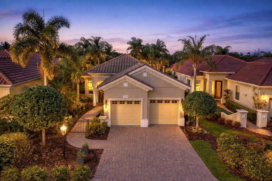 A rare opportunity behind the gates of Lakewood Ranch Country Club, this beautifully reimagined Neal Custom home offers a refined yet effortless lifestyle from the moment you arrive. Tucked within a private courtyard setting, a garden-lined path leads to the entrance, creating a sense of quiet privacy while still being moments from everything Lakewood Ranch has to offer.  Inside, natural light fills the open, airy layout, enhanced by soaring ceilings, crown molding, and plantation shutters that add a timeless elegance throughout. Fresh interior paint and thoughtfully selected finishes create a warm, inviting atmosphere while maintaining the home’s classic character. Designed with both everyday living and entertaining in mind, the home features two private bedroom suites and a versatile den that easily functions as a third bedroom, office, or additional retreat. An added flex space—ideal as a dining room or library—enhances the home’s functionality while maintaining a seamless flow.  At the heart of the home, the beautifully updated kitchen blends timeless design with modern convenience, featuring Café appliances, quartz countertops, refaced cabinetry, and elegant marble-inspired details—all opening naturally to the main living areas.  The living experience extends outdoors, where an expansive covered terrace captures sweeping views of the golf course, lake, and preserve. This peaceful setting offers the perfect backdrop for morning coffee, evening gatherings, or simply enjoying Florida’s natural beauty, with additional yard space along the water enhancing both privacy and livability.  Over $100,000 in thoughtful improvements ensure the home lives as beautifully as it presents, including updated bathrooms and new tile throughout key areas. The existing bamboo wood flooring has been intentionally preserved for its durability and warmth, adding character to the home’s refined interior, while the whole-home water purification system further enhances everyday living. Major updates—TRANE A/C (2021), gas water heater (2022), impact glass windows (2018), and a full interior refresh in 2025 with new appliances and washer/dryer—provide true peace of mind.  Located within the intimate Presidio enclave, residents enjoy a lock-and-leave lifestyle with low HOA fees covering complete grounds maintenance, along with access to a private heated pool, spa, and clubhouse just steps away.  Ideally positioned near Waterside, Lakewood Ranch Main Street, UTC, Sarasota-Bradenton International Airport, downtown Sarasota, and the Gulf’s renowned beaches, this home also offers optional Country Club membership with access to golf, tennis, fitness, and a vibrant social lifestyle.  Homes offering this level of privacy, updates, and low-maintenance living in such a premier setting are rare—presenting an exceptional opportunity within one of Lakewood Ranch’s most sought-after communities.