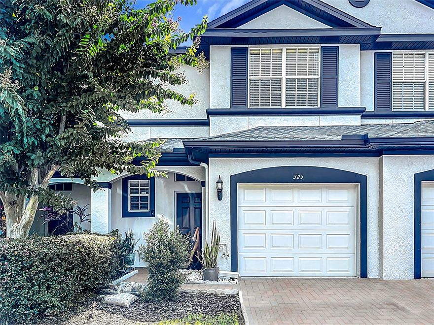 This property qualifies for a 30-year fixed conventional Loan with $0 down-payment, NO PMI, NO Income Limitation and $10,000 Down Payment Assistance for qualified buyers.  Welcome to this beautifully maintained home in a peaceful neighborhood just minutes from top dining, shopping, and attractions. The first floor features stylish grey wood-look tile throughout, complementing the open-concept layout that flows from the living and dining areas into the kitchen. The kitchen boasts granite countertops, stainless steel appliances, abundant cabinetry, and a spacious island—ideal for entertaining. Upstairs, the primary suite offers two walk-in closets with custom shelving and a private ensuite with dual granite vanities and a walk-in shower. Two additional bedrooms share a modern full bath. Recent updates include a new roof (2023), carpet in secondary bedrooms, garage door opener (2021), garbage disposal (2021), and extended tile flooring (2021). Washer, dryer, and garage shelving convey. With thoughtful upgrades, ample storage, and a prime location, this move-in ready home is a must-see!