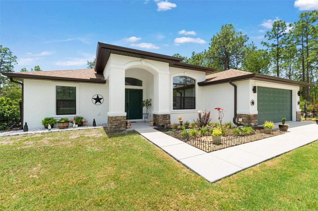 Photo of 11096 Wood Owl Avenue, Weeki Wachee, FL 34614 (MLS # W7886099)