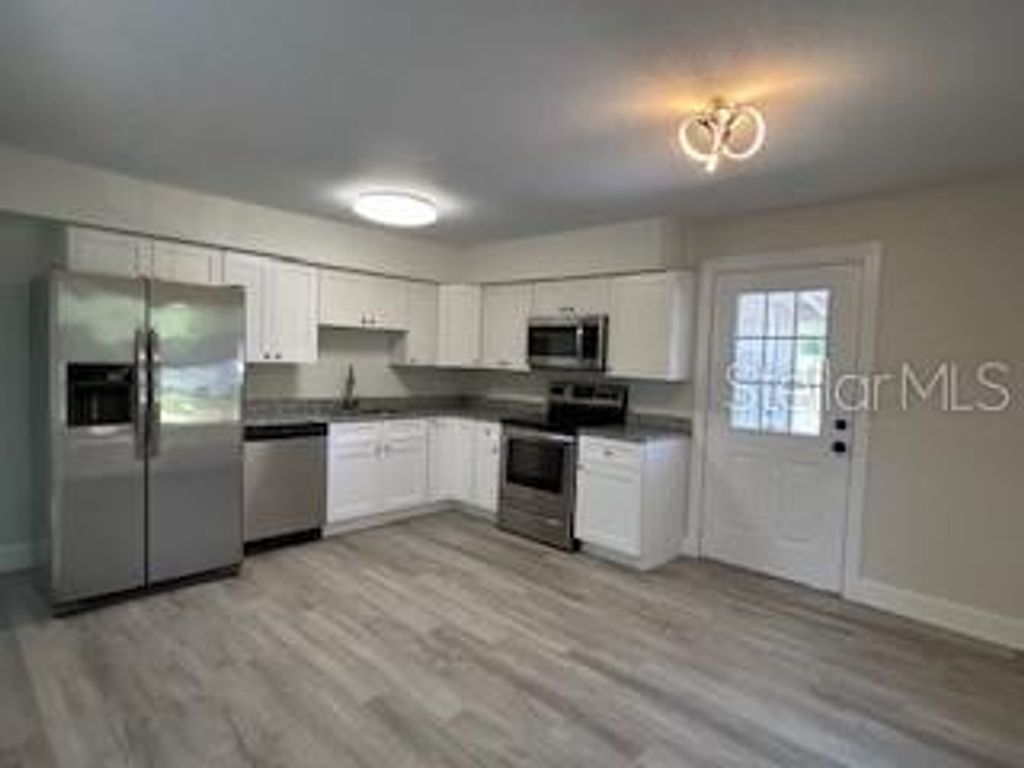 Photo of 917 E Poinsettia Avenue, Tampa, FL 33612 (MLS # TB8498617)