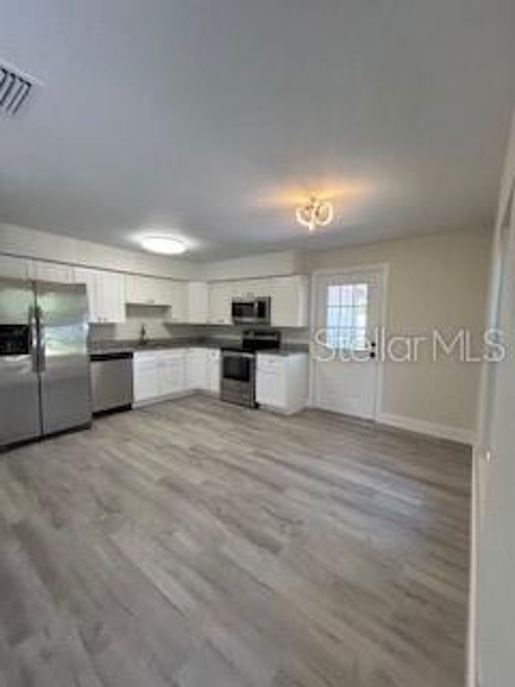 Photo of 917 E Poinsettia Avenue, Tampa, FL 33612 (MLS # TB8498617)