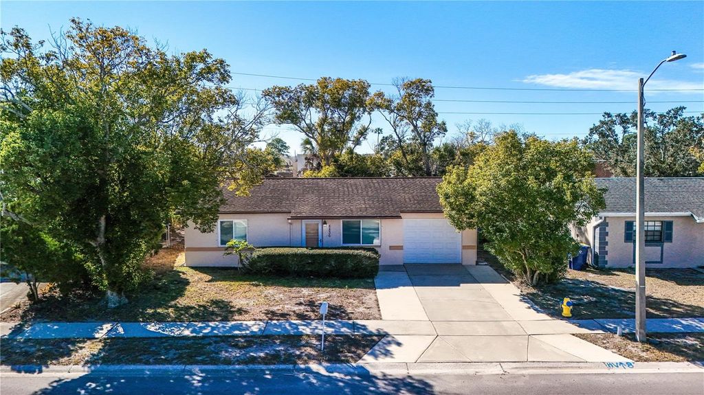 Photo of 8836 Huntsman Lane, Port Richey, FL 34668 (MLS # TB8474674)