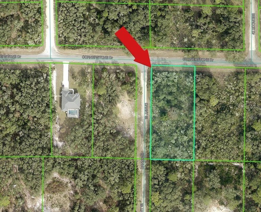 Discover the perfect blend of rural charm and modern convenience with this nearly one-acre (.98) parcel on Cornerstone Drive. Though just under an acre, the wooded surroundings and limited road visibility create a peaceful, secluded feel, making it an ideal setting for privacy and relaxation. Enjoy close proximity to the Withlacoochee State Trail while still being a short drive from the shops, dining, and services of Brooksville and Dade City. Electric service is available along the road, and with no HOA, you’ll have the freedom to build your dream home or create a private weekend retreat. Endless possibilities await on this versatile and inviting property.