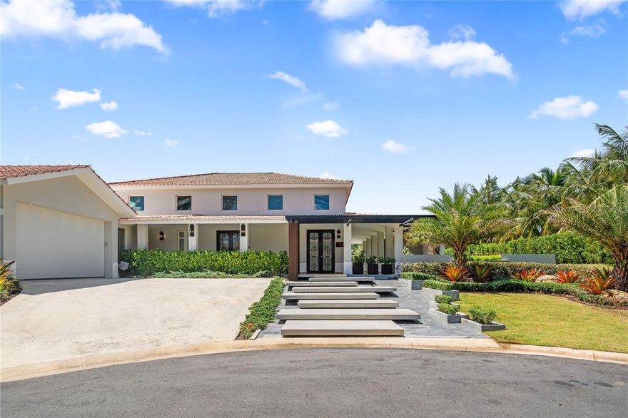 Indulge in the Ultimate Resort-Style Luxury Living at Sabanera Dorado!
Welcome to this exquisite Casona Carbia model, meticulously transformed through a comprehensive renovation, now boasting a breathtaking residence offering over 5,200 square feet of interior opulence. As you step inside, your senses are immediately captivated by the stunning marble floors that grace every inch of this home.
This extraordinary property features three generously proportioned bedrooms and a versatile flex room, each thoughtfully designed with abundant closet space and bathed in natural light. The master suite is nothing short of spectacular, showcasing dual walk-in closets and an elegantly appointed ensuite bathroom.
Every facet of this renovation reflects an unwavering commitment to precision and style. The modern kitchen exhibits sleek design elements and top-of-the-line appliances, seamlessly integrated into custom cabinetry to create a harmonious and refined aesthetic.
The family room is enveloped in natural light, thanks to its expansive glass walls and doors, delivering a seamless indoor/outdoor experience, imbuing the entire space with a fresh, contemporary ambiance.
Step into the sprawling outdoor haven, perfect for entertaining or savoring the serenity of the surrounding nature. The backyard is a lush oasis, featuring verdant greenery, an impressive pool, and an outdoor kitchen & an outdoor bathroom.
Furthermore, a robust 35 kWh power generator, an additional diesel tank, and a water cistern ensure uninterrupted functionality during any power outages.
In conclusion, this beautifully revitalized Casona Carbia model in Sabanera Dorado epitomizes the pinnacle of luxury living. With its expansive outdoor sanctuaries, sumptuous finishes, and cutting-edge amenities, this home offers an oasis for those in pursuit of the ultimate modern lifestyle.