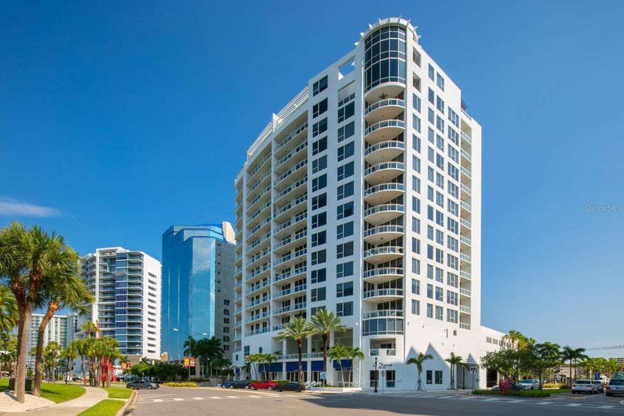Savor sweeping views of Sarasota Bay, John Ringling Bridge, Marina Jack and Lido Key in this well-appointed 3-bedroom, 3.5-bathroom residence in the luxury 15-story Marina Tower. A vibrant downtown lifestyle awaits an easy stroll away, including abundant fine dining, art galleries, boutiques, theater district and historic opera house. The 2,635-SF condominium features a combined kitchen, living room and dining area overlooking serene azure waters, high ceilings and travertine marble flooring in most common spaces. Sliding glass doors in the main living area, en-suite guest bedroom and third bedroom open to an expansive covered patio, where you can relax and soak in the picturesque surroundings. The kitchen, completing remodeled in 2017, features an island, electric cooktop, oven/microwave, built-in double wine cooler, custom cabinets and stone countertops. There is also a small den/office. In addition to its proximity to everything the downtown offers, the condominium is just a short drive over the Ringling Bridge to bustling St. Armands Circle and Lido Key’s pristine white-sand beach on the Gulf of Mexico. Marina Tower is a highly desirable building with an array of resort-style amenities, including a heated pool and spa, fitness center, private guest suite, community room with catering kitchen and 24-hour security. The unit includes two deeded parking spaces in a secure under-building garage. Don’t miss this rare opportunity to make residence your own.
