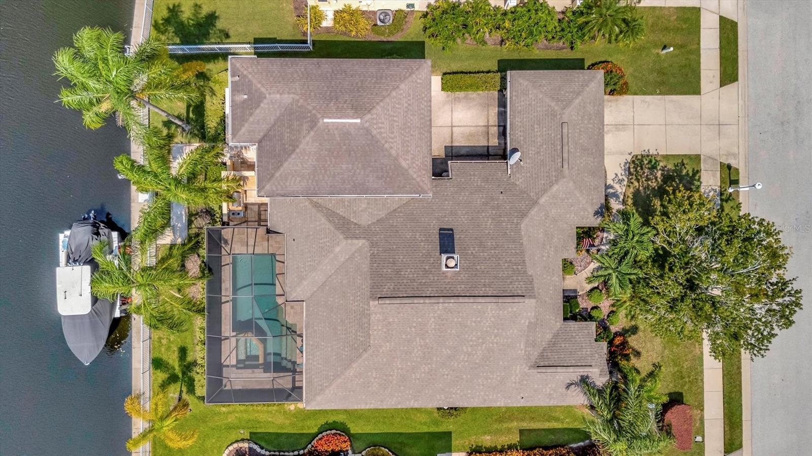 Enjoy the ultimate waterfront lifestyle in this stunning 2-story residence in Bradenton! With its prime location take advantage of protecting your boat in fresh water while also being able to cruise to open water via the lift that provides Gulf access down the Manatee River, this property offers breathtaking water views, endless boating and fishing opportunities, and a tranquil atmosphere. The spacious interior features 4 bedrooms and 3 bathrooms, and the kitchen features granite counters, glass front cabinets, a gas range, and an island with a wine fridge perfect for entertaining. Enjoy the picturesque views from the expansive backyard, with a sparkling pool, patio, and outdoor kitchen. Don't miss this incredible opportunity to own a piece of paradise!