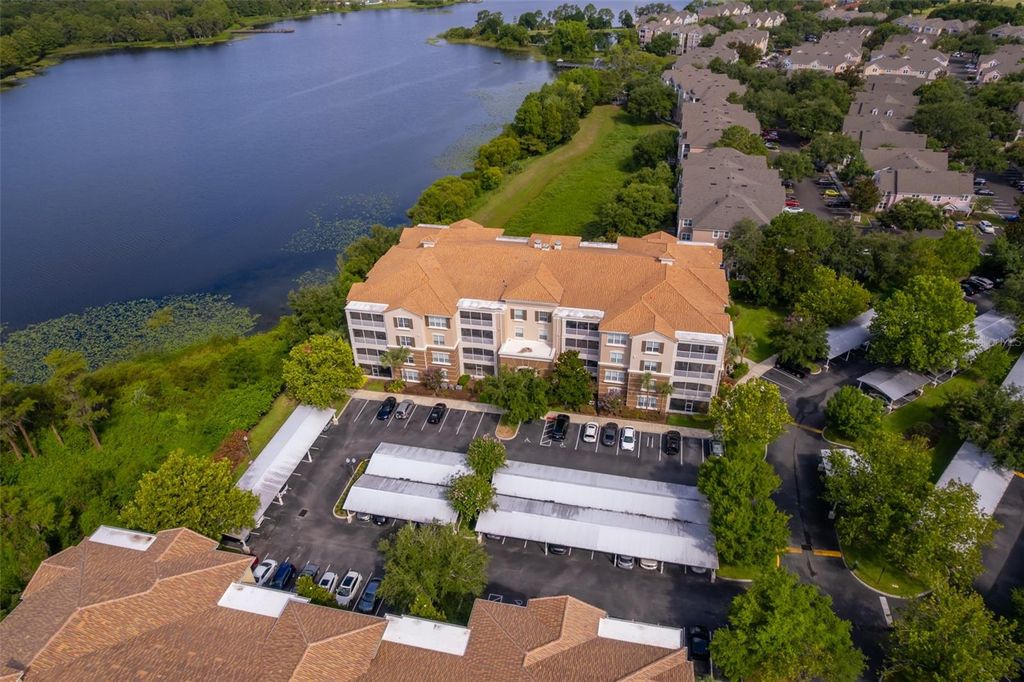 Photo of 3356 Robert Trent Jones Drive #403, Orlando, FL 32835 (MLS # O6381560)