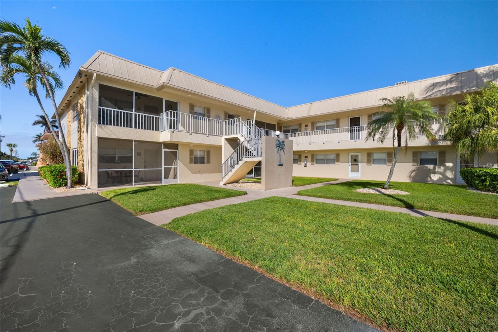 Discover your perfect home with this charming 2-bedroom, 2-bath gulf access condo, perfectly located for those seeking both peace and convenience. Nestled in the desirable SE Cape Coral CRA area, this lovely condo offers water views and easy access to the Gulf, making it ideal for boating enthusiasts. Enjoy your morning coffee or evening drinks on the cozy screened balcony, taking in the beautiful surroundings. The dock is first come first serve and currently there are no boats present. Turn the owner suite into your tranquil retreat with your personal touches. Here you will also find a walk in closet and your en-suite bathroom with a shower. This community had no flooding, nor water intrusion from the recent storms and has been fiscally responsible. Another bonus is that your water and sewer is included in the maintenance fee. Adjoining the property is a small park. This condo is conveniently close to shopping and dining options, including a farmers market, where you can indulge in fresh produce and local goods. Don’t miss the opportunity to own this slice of paradise – schedule a private tour today!