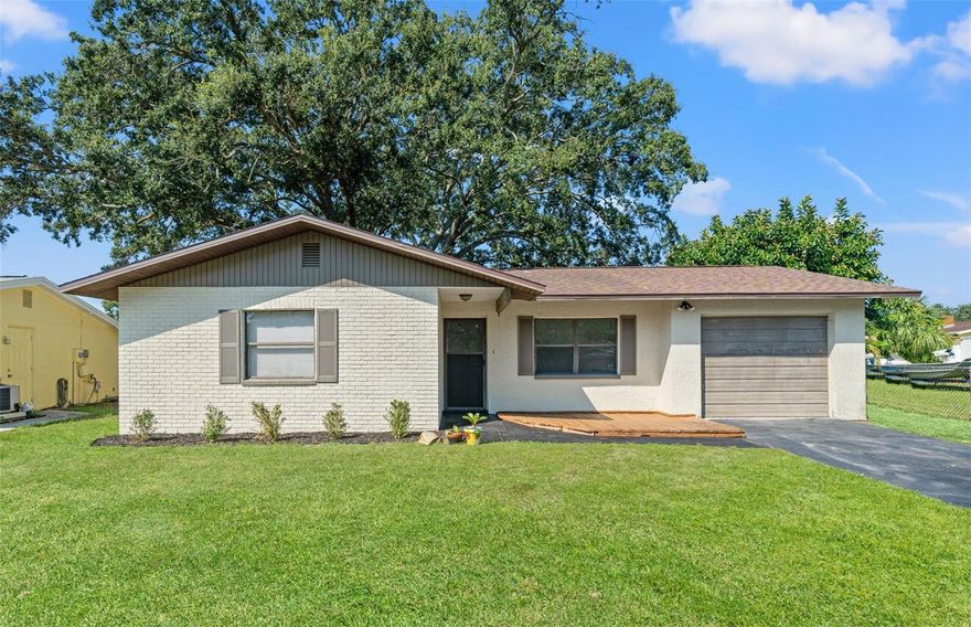 Welcome to 5828 Mariposa Drive in Holiday, FL — a charming 2-bedroom, 2-bath home offering 973 square feet of comfortable living space. This home is move-in ready with plenty of potential for first-time buyers, downsizers, or investors. Inside, you’ll find a great layout with tile floors and carpet in the bedrooms. The kitchen has wood cabinetry and granite countertops, and a spacious master suite complete with a walk-in closet and private bath. The second bedroom and bath provide flexibility for guests or family, while the attached one-car garage includes washer and dryer hookups, a 2nd refrigerator, deep freezer and extra storage. Outside, the fenced in backyard offers the perfect space for pets or weekend gatherings with a hot tub included! Located in the established Forest Hills East neighborhood, this property is close to shopping, dining, medical services, golf courses, and just a short drive to Florida’s famous beaches. With no HOA, affordable taxes, and a convenient location near schools and amenities, this home combines value and lifestyle in one great package.