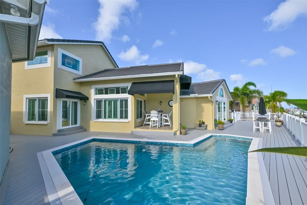 Photo of 831 Symphony Isles Boulevard, Apollo Beach, FL 33572 (MLS # TB8512623)