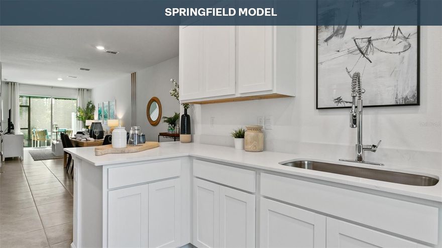 Under Construction. The Springfield townhome is a thoughtfully designed floor plan that offers a surprising amount of space and comfort within approximately 1,308 square feet. With three bedrooms and 2.5 bathrooms, this inviting two-story home is ideal for homeowners seeking a functional layout that still feels open and bright. The main level features a seamless flow between the kitchen and living area, creating a welcoming environment for both relaxing and entertaining. 


The kitchen is designed with ample counter space and storage, making meal preparation easy while staying connected to family and guests in the adjacent living room. Sliding glass doors bring in generous natural light, filling the home with warmth and enhancing the open feel of the living spaces throughout the day. 


Upstairs, the primary suite provides a peaceful retreat, complete with a spacious walk-in closet and a well-appointed bathroom with a large vanity. Two additional bedrooms offer flexibility for guests, children, or a dedicated home office. Built with energy-efficient features and modern construction standards, the Springfield delivers long-term value and everyday comfort in desirable new home communities across North Florida, making it an excellent choice for today’s buyers.