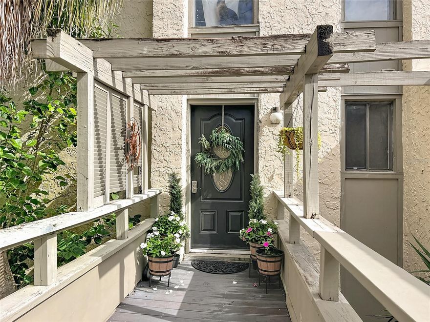 Welcome to the tropical paradise of the Springs! This beautiful 2 bedroom 2 bath second story condominium has been up-dated and is ready for its new owner. Once you enter this home you will be swept away by its soaring ceilings and light and bright windows. This beautifully decorated home feels so much larger than it is. Enjoy your up-dated kitchen with plenty of storage and work space; great for entertaining friends and family. The dining area is open and bright, and adjoins the family room featuring a built-in fireplace with vaulted ceilings and natural light, and leads to your private one-of-a-kind balcony. The primary bedroom with its vaulted ceiling is spacious and can accomodate large furniture. The ensuite bath features a walk-in closet, two vanities and a shower/tub combo. The primary bedroom also opens up to a private balcony; perfect for that morning cup of coffee. The large guest bedroom is spacious and is perfect for guests or even a roommate! A separate bath is just off the guest room. The guest room features an adjoining balcony. There is a large second story loft that would make a great office space, television room or even another bedroom. The possibilities are endless. The piece of resistance of this beautiful condo is living in the Springs; one of Longwood's premiere guard-gated communities. Your monthly HOA includes :Exterior Maintence, including roofs, grounds, pool, Water, Sewer and Trash. The Springs HOA also includes 24 hour gated security,and community access, Private nature trails, Access to the horse stables, The yearly event of the springs concerts and so much more. You will soon be living in a lush tropical paradise, that is close to everything including: Restaurants, Shopping, Medical and so much more! Call today to schedule your private showing.