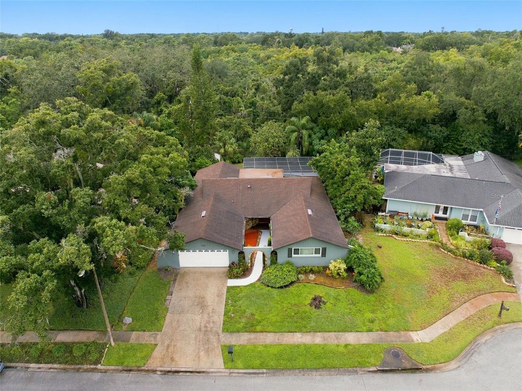 Photo of 1297 Peach Tree Drive, Dunedin, FL 34698 (MLS # TB8545967)