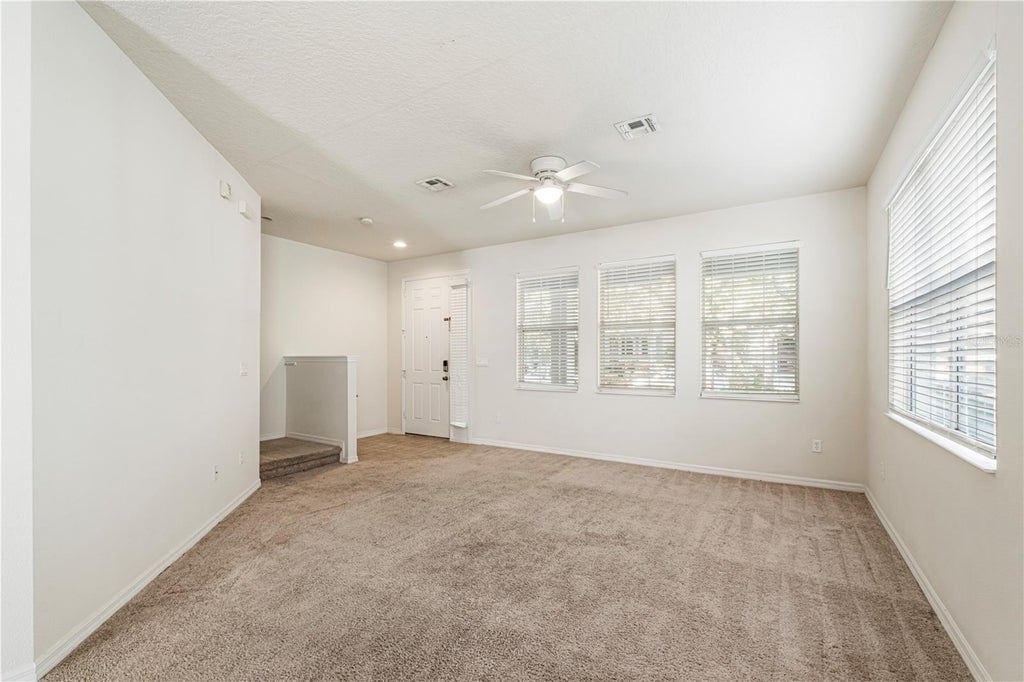 Photo of 8480 Leeland Archer Boulevard, Orlando, FL 32836 (MLS # O6441567)