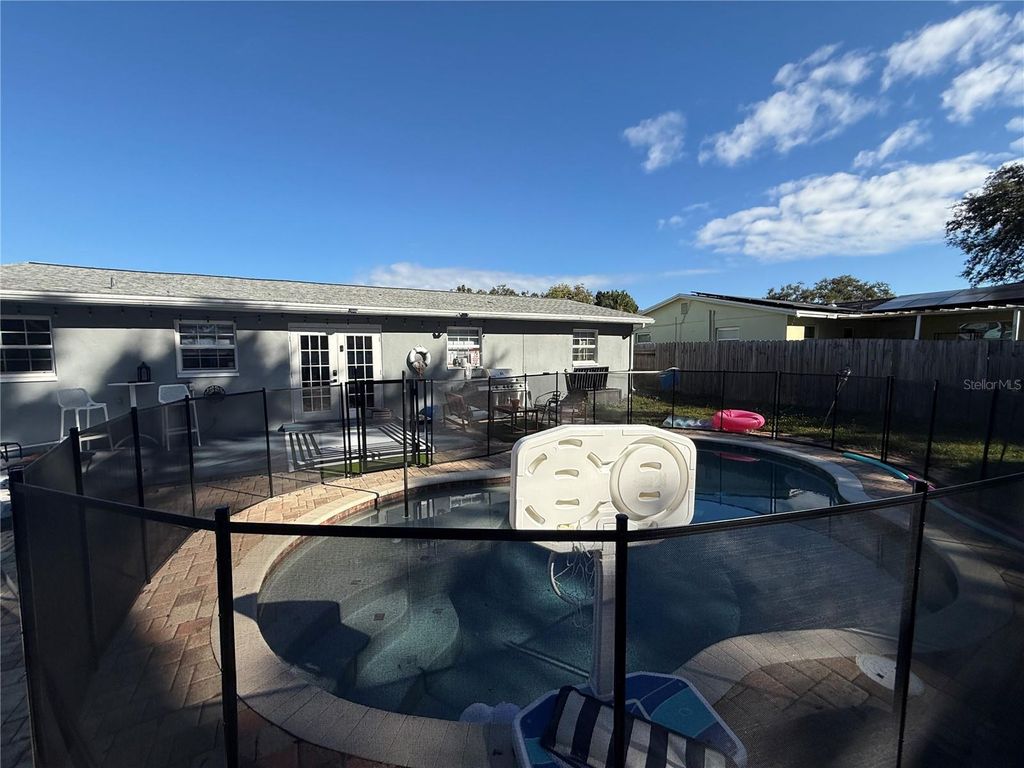 Photo of 3066 19th Place SW, Largo, FL 33774 (MLS # TB8463687)