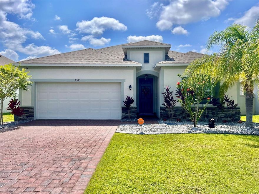 This beautifully upgraded home offers 4 bedrooms and 2 bathrooms with modern designs, custom features, and peaceful pond views with no direct neighbors in the front or the back, creating a rare sense of privacy and open space. Inside, the home features tile flooring throughout with no carpet, dimmable lighting in every room, and a stylish kitchen with stainless steel appliances, under cabinet LED lighting, and ambient island accent lighting that highlights the custom kitchen island seating area. The primary suite includes a professionally designed custom walk in closet with built in cabinetry, shelving, drawers, and storage. The other 3 bedrooms are in the opposite direction to create privacy. The laundry room has also been upgraded with custom cabinetry and storage solutions designed for added organization and functionality. The open concept living and dining area have a designer accent wall same as other walls throughout the home to add architectural character. From the living room you can access the screened lanai that opens to a tranquil backyard featuring California style steppingstone patio seating, pond views, and a fully fenced yard with an additional enclosed dog run. Also, it has a custom motorized sliding door shade provides convenient privacy and light control and can be operated by remote or smartphone. Additional thoughtful upgrades include a smart home security system, whole home water softener system, customizable exterior color changing lighting, an EV ready garage outlet suitable for electric vehicle charging, dimmable lighting throughout the home, and a built in in wall pest control system. A thoughtfully upgraded home offering comfort, privacy, and modern convenience in one of Palmetto’s most accessible locations with quick and convenient access to I 275 and I 75, making travel to Tampa, St. Petersburg, Sarasota, and nearby airports fast and easy.