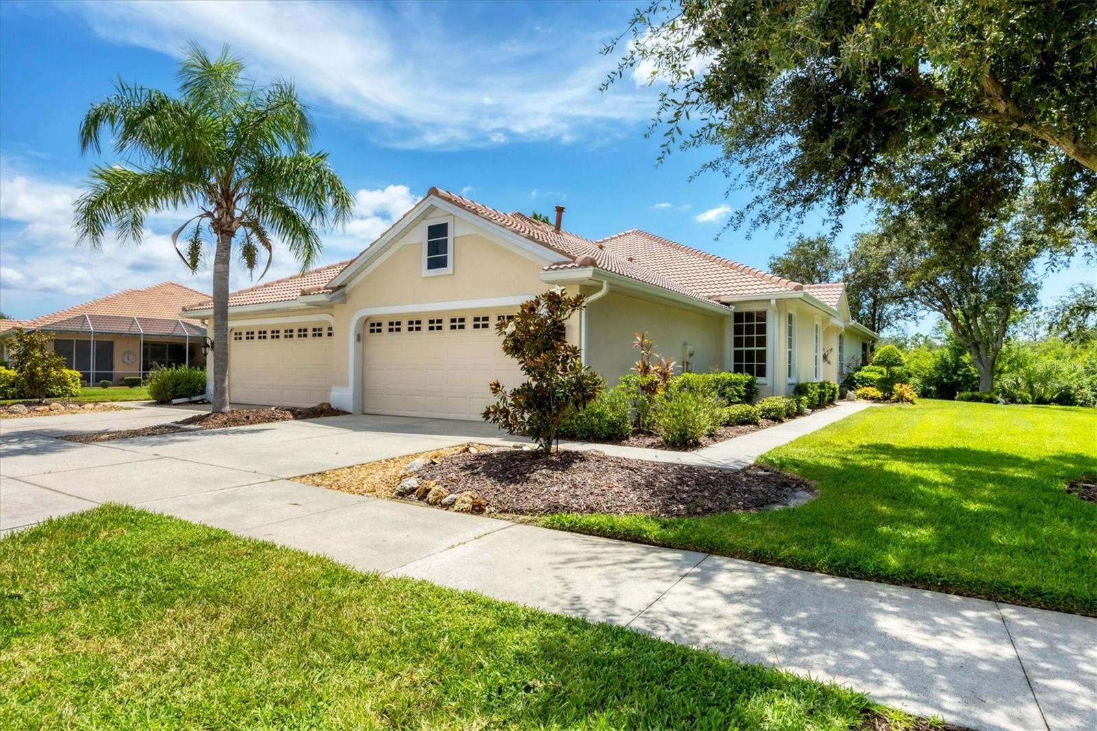 **Heron Creek Golf and CC** Turn-Key Furnished Paired villa 2 Bedroom + Den/ 2 Car Garage/ NEW TILE ROOF !!WELCOME TO “VILLA SIRENA” a turnkey coastal retreat with sea whimsy and stylish upgrades in Heron Creek Golf & Country Club. Tucked into a peaceful, park-like setting with a rare private side yard, Villa Sirena offers a harmonious blend of lighthearted coastal charm and modern-day sophistication. Located in the sought-after, gated community of Heron Creek, this 2-bedroom plus den/flex room villa is being sold turnkey furnished—ready for immediate occupancy or to serve as a seasonal or long-term income-producing rental until you’re ready to make it your forever retreat. Inside, soothing tones and curated décor bring the magic of Florida’s Gulf Coast to life—playful mermaids, seashell touches, and cheerful beach signs evoke the feeling of an Endless Summer, while crisp gray walls, classic white trim, and on-trend finishes create a casually elegant backdrop. The kitchen is a showstopper and bigger than many single-family homes! It is both functional and fabulous, featuring rich wood cabinetry, exotic granite countertops with more than ample workspace, a stack-stone tile backsplash, under cabinet lighting for ambiance, full suite of Samsung stainless steel appliances, including a NATURAL GAS RANGE a delightful bonus for avid cooks and a sunny dinette with shiplap-accented wall that adds texture and charm. The built-in wine bar makes entertaining effortless, and the open-concept great room offers space to relax, host, or dine in style. The desirable split-bedroom layout ensures privacy. There is a private guest suite to the front of the villa with an adjacent full bath and the den with solid French doors provides flexibility for guests, work, or hobbies. The Primary bedroom is spacious and has an ensuite bath with dual sinks and exquisite granite counter tops and a large walk-in closet. The great room opens on to the screened lanai, a perfect place to enjoy the breeze, a book, or a sunset toast and savor the tranquility of the private homesite. Villa Sirena(Mermaid) has a unique vibe all her own and you’ll be sure to feel it the moment you walk in…. Decor elements like all the whimsical and beachy touches will remind you that every day here feels like vacation. It the kind of home that makes you breathe deeper, smile wider and imagine your best life unfolding one relaxed sunset at a time. Do not hesitate she’s one of a kind! Heron Creek offers exceptional amenities including a 21,000 sq ft clubhouse, 27 holes of Championship golf Arthur Hills design, resort style pool & spa, a robust social calendar, fitness center, Tennis courts & formal & casual dining options! *NO CDD FEES * LOW HOA FEES conveniently located w/easy access to I-75 & US-41, Cocoa Plum Shopping , WELLEN PARK, Braves Stadium, COSTCO & just 3 miles to the new 450 Million SMH Hospital Coming to I-75 / Sumter Blvd!