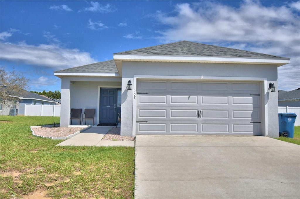 Photo of 207 Sandestin Drive, Haines City, FL 33844 (MLS # G5118802)