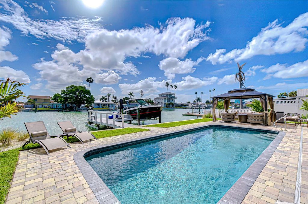 Photo of 728 Pruitt Drive, Madeira Beach, FL 33708 (MLS # TB8494283)