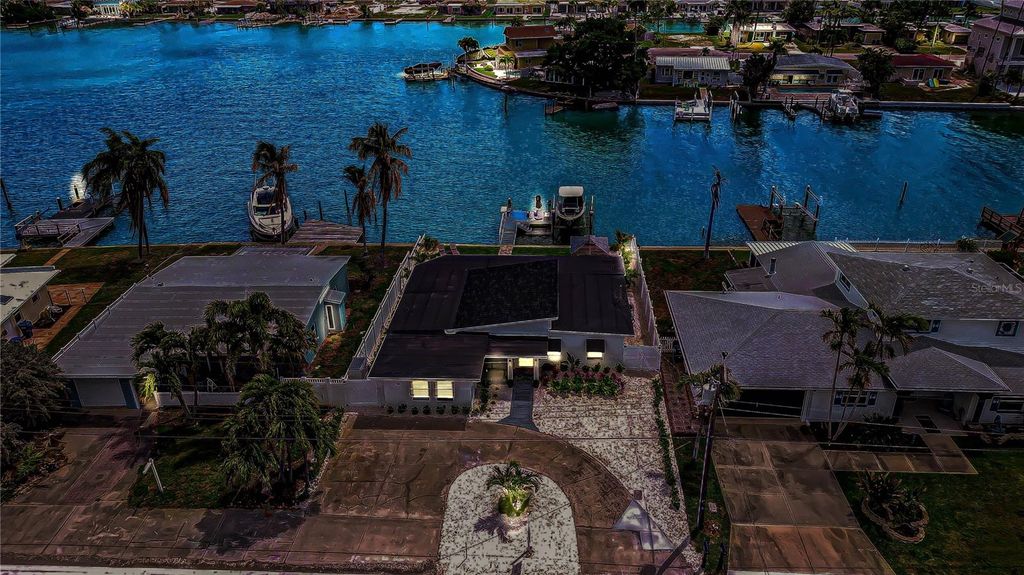 Photo of 728 Pruitt Drive, Madeira Beach, FL 33708 (MLS # TB8494283)