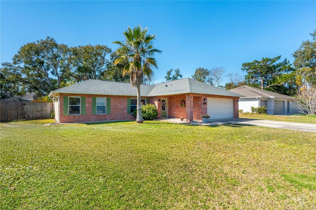 Photo of 1628 Victory Palm Drive, Edgewater, FL 32132 (MLS # NS1087322)