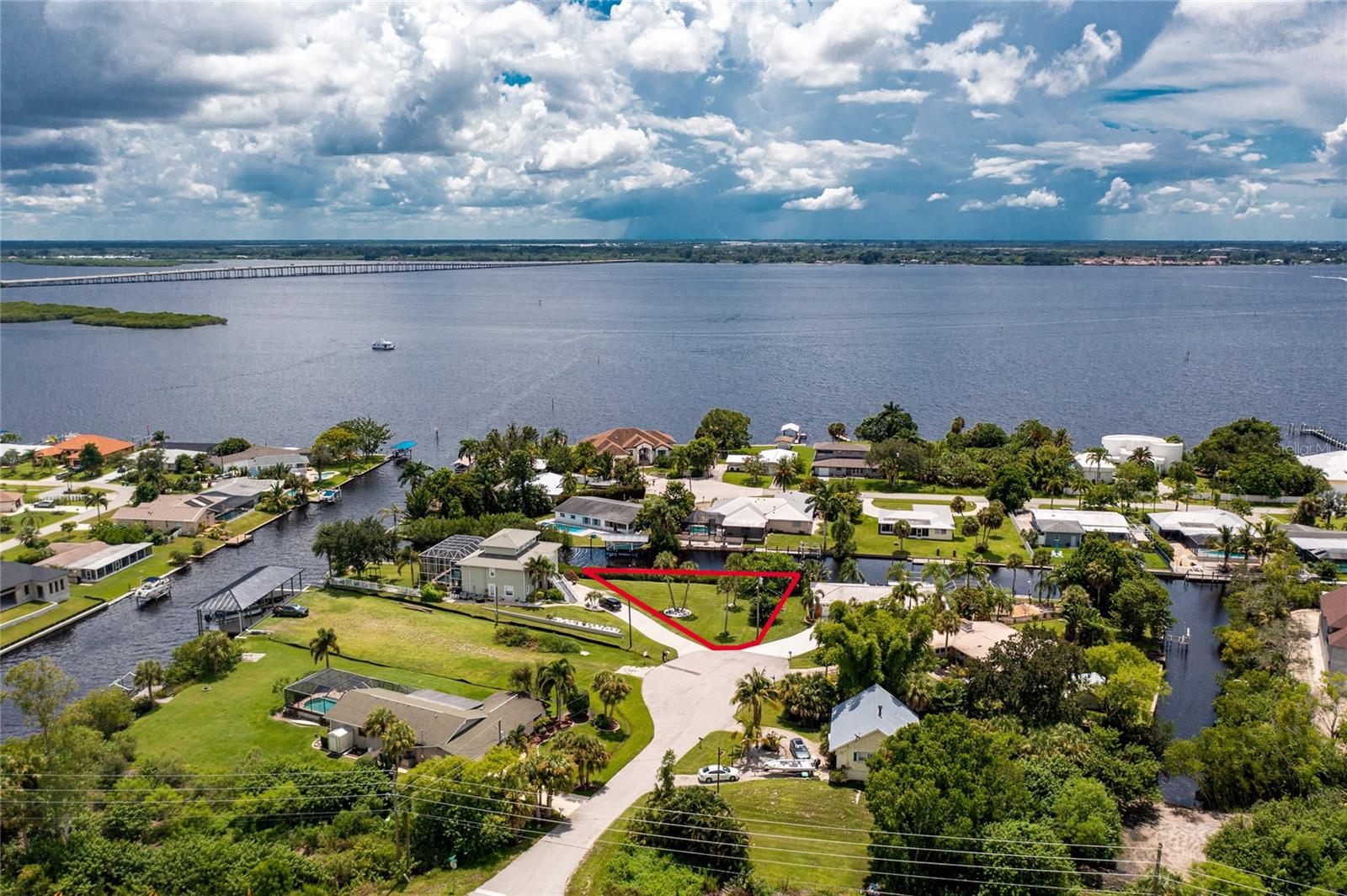 Don't miss this opportunity to build your dream home on this BEAUTIFUL OVERSIZED canal lot MINUTES FROM THE GULF. Virtually on the Peace River, this property has 160 feet of waterfront with sailboat access to Charlotte Harbor and the Gulf of Mexico. Electricity available and mostly cleared will save some money on site preparation. Owners have boundary and topography survey. Quick access to I75 and close to shopping, dining, golf, hospitals, world class beaches and the new Sunseeker Resort makes this a very desirable area to make it "your home".