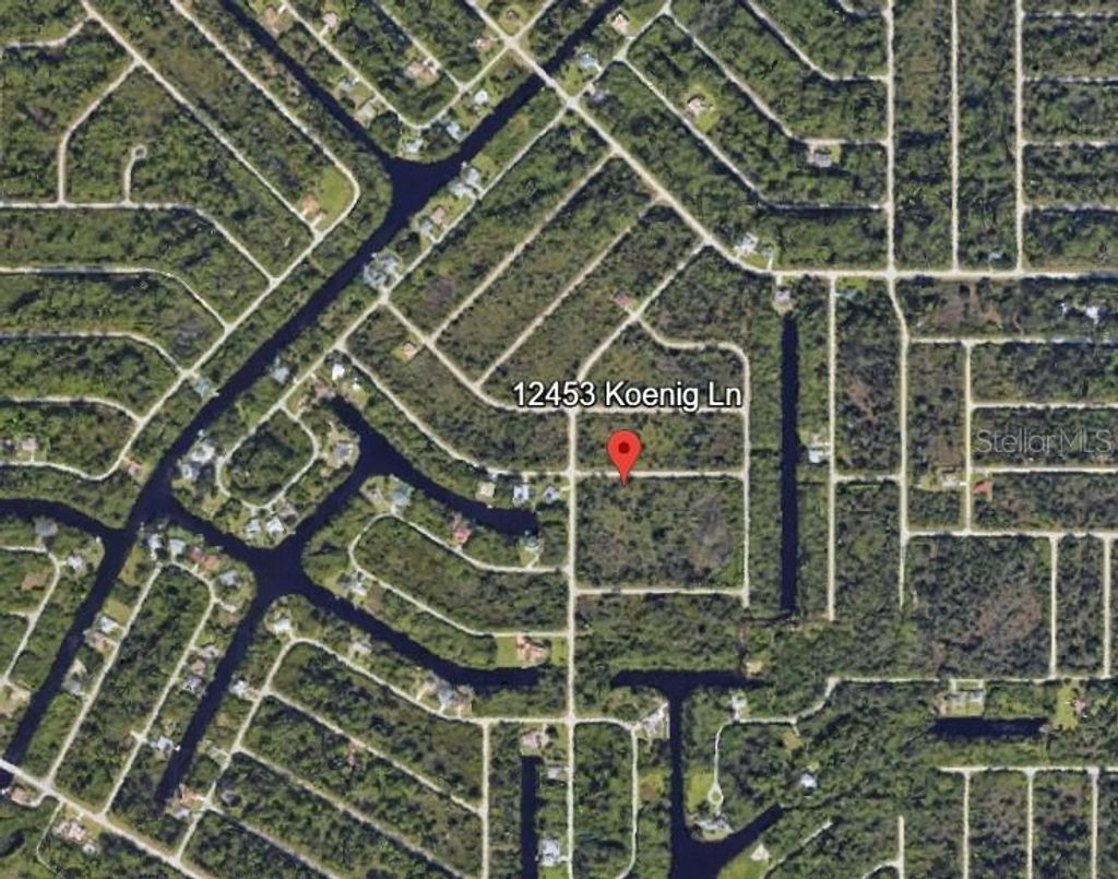 Photo of 12453 Koenig Lane, Port Charlotte, FL 33953 (MLS # A4662751)