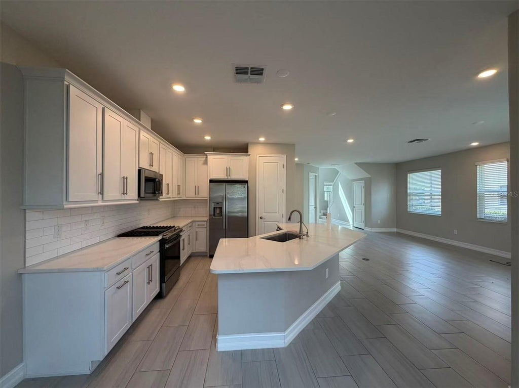 Photo of 4565 Ancona Way, Wesley Chapel, FL 33543 (MLS # TB8521912)