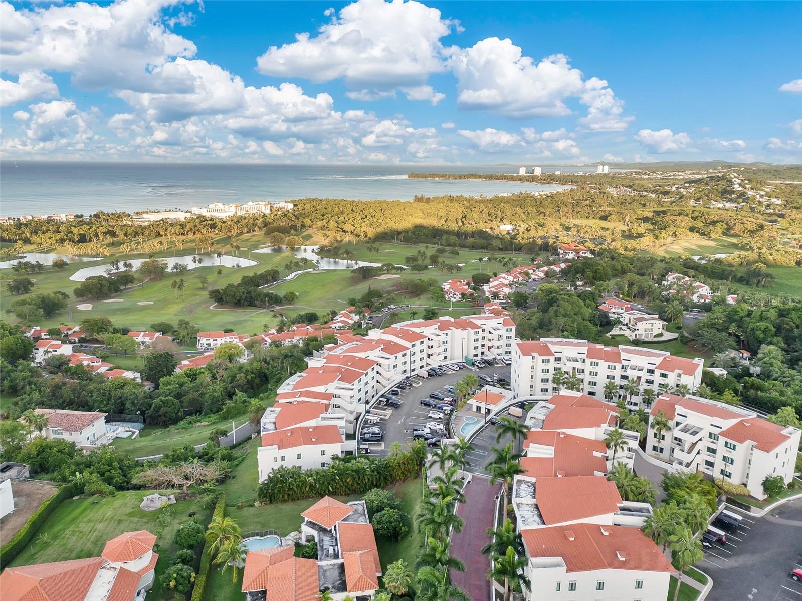 Experience refined tropical living at this ocean view penthouse in Vistas del Cacique Cluster VII, nestled within the gates of the Wyndham Grand Rio Mar Puerto Rico Golf & Beach Resort on the island’s East Coast.
This fully furnished 2,288 sq. ft. residence offers four bedrooms, each with its own bathroom. The primary suite includes a spacious walk-in closet and an en-suite bathroom. A convenient powder room is also available. The expansive kitchen and open terrace design create a seamless transition between indoor and outdoor living spaces.
For your convenience, the building features a full-power generator, a water cistern, and gated access. The property includes three parking spaces.
Additionally, the Wyndham Grand Rio Mar Resort offers beach access, oceanfront pools, a spa, a casino, a state-of-the-art gym, nine restaurants, shops, and tennis courts. Hotel guests can also enjoy two world-class, 18-hole golf courses.
The resort is ideally located just a short drive from the airport and San Juan. Rio Grande is known for El Yunque National Rainforest, its delectable cuisine, and its proximity to Carabalà Rainforest Adventure Park.