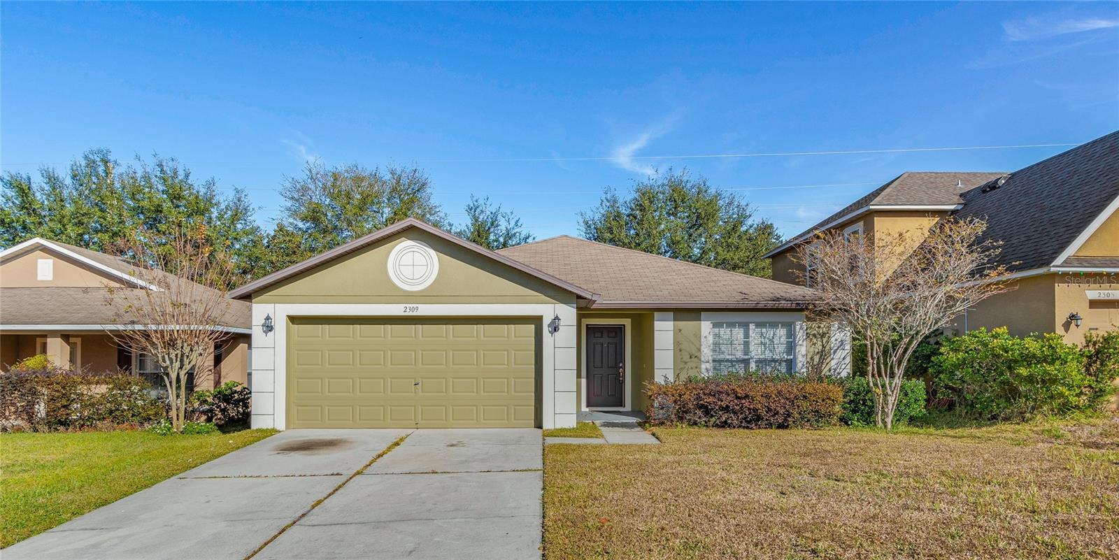 Comfortably situated on Norwood Place just off Florida 19, this beautifully updated 1,664 sq ft home offers charm, privacy, and convenience in the desirable Martin’s Grove community. With fresh interior and exterior paint, traditional fixtures, and a welcoming layout, this home is move-in ready. Enjoy a quiet setting set back from the road, a tree-shaded backyard, and easy access to local highlights like Downtown Tavares, Lake Dora, and Mount Dora.
Home Highlights:
3 Bedrooms / 2 Bathrooms – including a large master suite with walk-in closet, full bath with double vanity, and linen storage
New Luxury Vinyl Plank Flooring – throughout bedrooms and living areas
Spacious Kitchen – with open views to dining and living room; access to patio via sliding glass doors
Stylish Bathrooms – hard surface counters, stone-wall showers, towel racks, and tiled floors
Flexible Layout – third bedroom can double as home office near the front foyer
Laundry Room – includes storage shelf
2-Car Garage – plus ample interior storage throughout
Community Amenities – landscaped entrance, playground, common area, and mailbox nearby
Prime Location – just 1 mile to Lake Dora and Downtown Tavares, 16 minutes to Downtown Mount Dora
Cats and Dogs allowed. 35lbs Or less. $350 Pet fee, per pet. Max of 2 pets. Additional $20 per month, per pet monthly pet rent. No aggressive breeds.