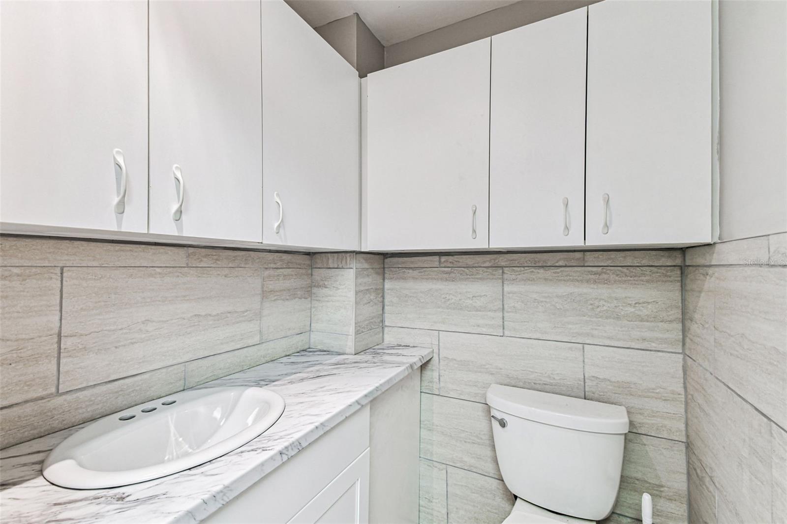 ONE CARROLLWOOD PLACE A CONDOM - Commercial Sale