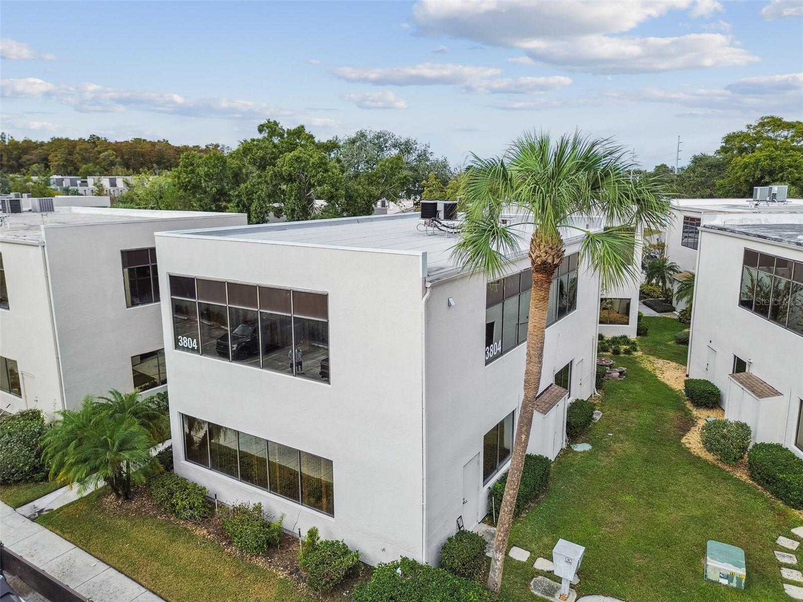 ONE CARROLLWOOD PLACE A CONDOM - Commercial Sale