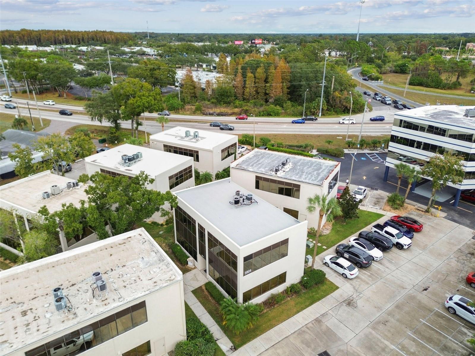 ONE CARROLLWOOD PLACE A CONDOM - Commercial Sale