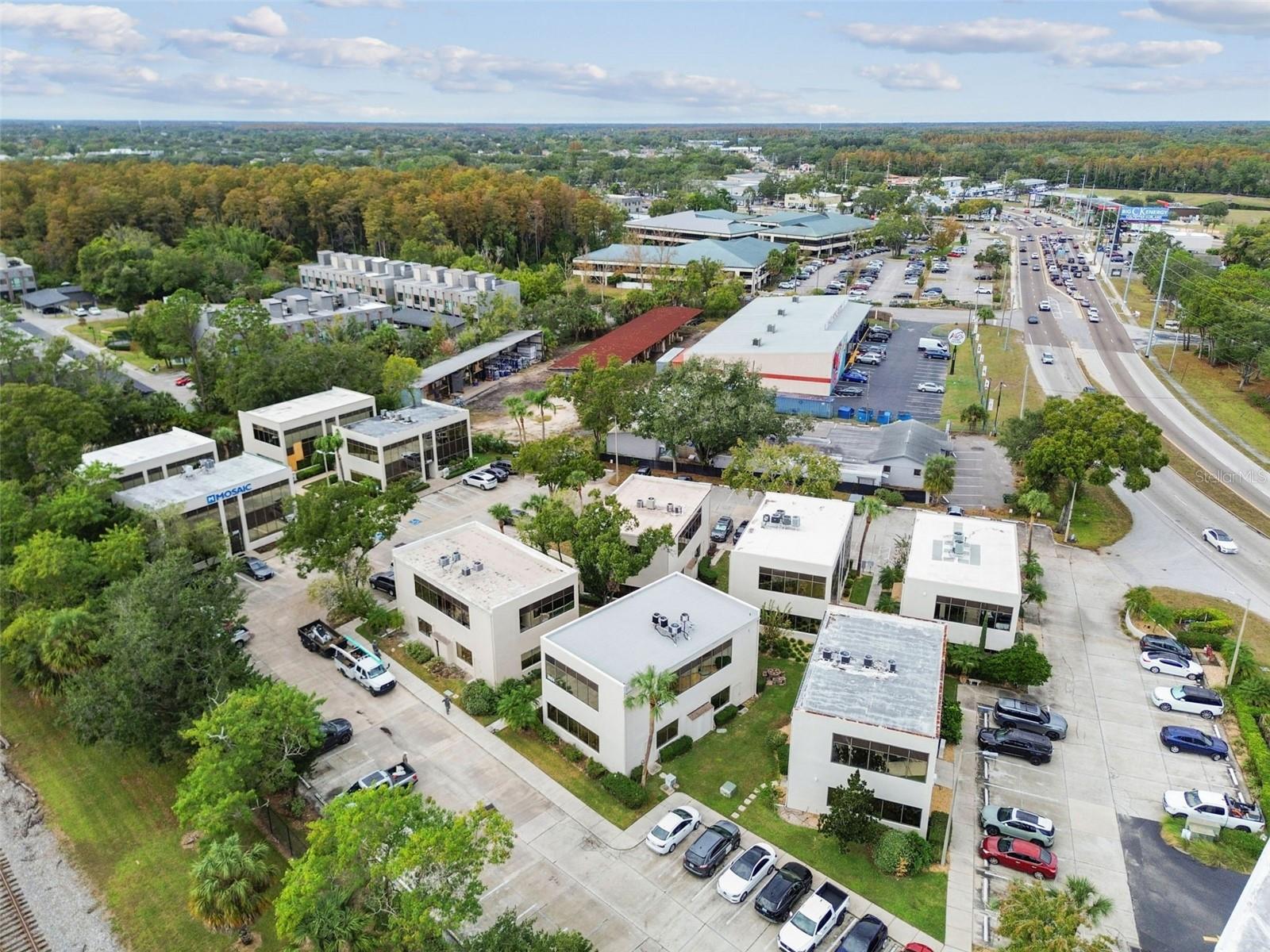 ONE CARROLLWOOD PLACE A CONDOM - Commercial Sale