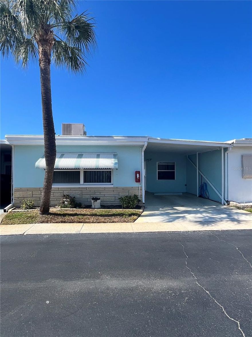 Welcome to 250 Rosery Rd. NW #260 located in the beautiful area of Largo, FL. This 55+ community is a great location if you are looking for a quiet neighborhood that is well maintained and has all the amenities one could want. This unit is a 1 Bedroom/2 bathroom unit at 594 Sq. Ft. with a BONUS room providing extra space within the home. This unit features a covered carport with 1 parking spot and additional parking spots directly across the street for potential guests. Throughout the condo are terrazzo and laminate flooring & fresh new paint throughout the entire unit.  When entering the property you are greeted with the family room with plenty of organic sunlight that can be controlled by the manual shades in the front of the home. Directly to the right of the family room is the master bedroom with a ceiling fan, walk-in closet and a full bathroom. Walking out of the master bedroom off to the left is the kitchen. The kitchen is an open concept with a refrigerator, stove/oven, portable kitchen island. From the kitchen leads into the BONUS room with plenty of space to store additional items, or make into another room. This room has plenty of sunlight as well that comes through the windows towards the back of the carport. There are HOA fees costing $173.00/Month which do cover water, sewer, trash, clubhouse & Pool. This unit is also located in Flood Zone X, which flooding will not be a worry of yours during the storm season. The community itself has many amenities such as community Pool, shuffleboard, fitness center, picnic tables, grills leaving plenty of items to entertain you and your guests. The location does not get much better considering you are only minutes away from numerous shopping plazas, restaurants, fitness centers and of course the best part some of Florida's best beaches (St.Petersburg Beach, Clearwater Beach, Madeira Beach). Do not miss this opportunity on this property and schedule your showing as early as today. Your new home awaits!