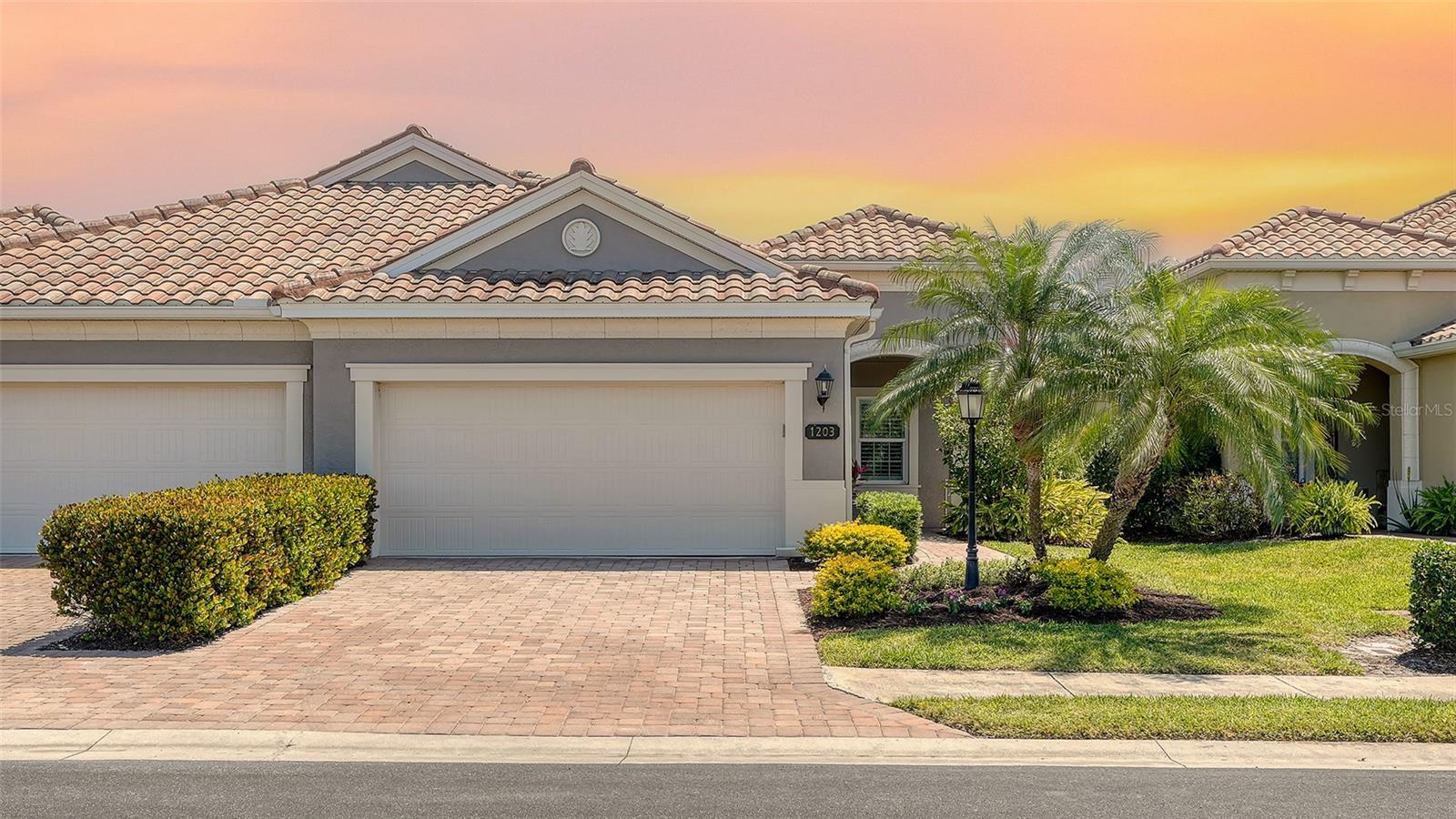 Welcome to this beautifully upgraded 2BR/2BA/2-car garage villa, nestled in the desirable gated community of Mirabella at Village Green. As you enter, you'll be greeted by the bright and airy open floor plan, complete with high ceilings, plantation shutters, and 8' doors. The eat-in kitchen is a true showstopper, featuring solid wood cabinetry, undermount sink, and stunning granite countertops throughout.
The spacious primary bedroom is a serene retreat, boasting a large walk-in closet and an elegant ensuite with dual wood vanities, walk-in shower, and sleek tile design. The living area is tastefully appointed with a tray ceiling, ceiling fan, and triple hurricane impact sliders, leading out to an expansive screened lanai with breathtaking water views.
This stunning villa also features a versatile office/study with 8' French doors, perfect for a home office or hobby room. The second bedroom is generously sized, with a walk-in closet and adjacent bathroom featuring a tub/shower combination. Additional features include an inside utility room with front-loading washer and dryer.
As a resident of this resort-style gated 55+ community, you'll enjoy a wide range of amenities, including pickleball courts, a dog park, fitness center, heated pool, spa, outdoor kitchen, grill, and clubhouse. The community is perfectly located near Anna Maria Island, Robinson Preserve, Downtown Bradenton, and a variety of dining and entertainment options.
This luxury villa has been meticulously maintained and is move-in ready. With cable, internet, pest control, and landscaping all included in the HOA, you'll enjoy a worry-free lifestyle. Don't miss out on this incredible opportunity to own a piece of paradise in Mirabella at Village Green! Schedule your showing today!