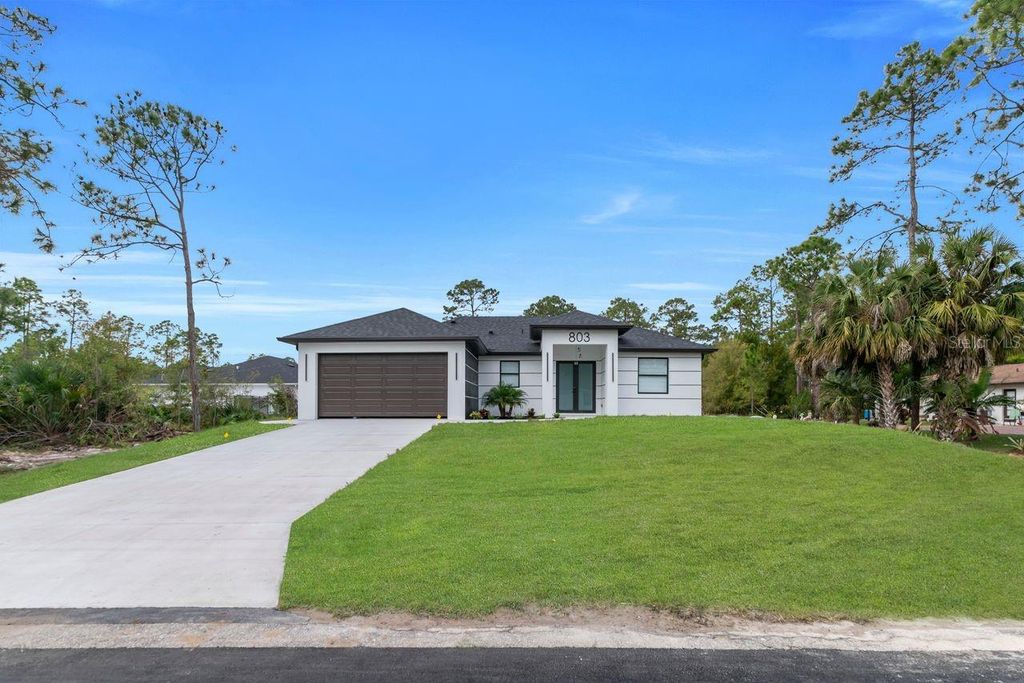 Photo of 803 Desoto Avenue, Lehigh Acres, FL 33972 (MLS # A4678506)